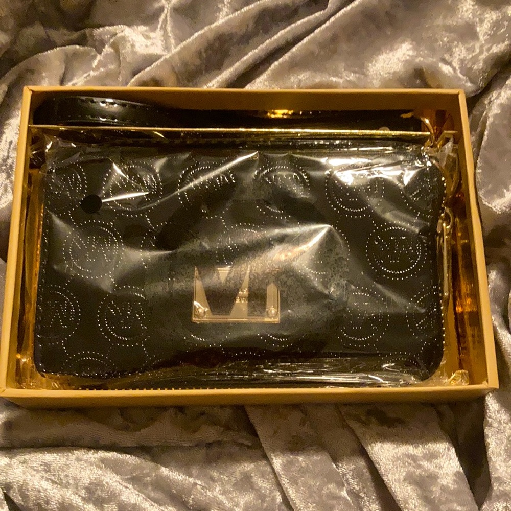 Michael Kors phone case wallet for smaller phones.